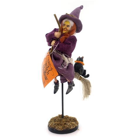 Cockcrowing the witch figurine